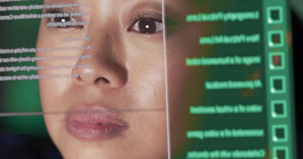 Image of a developer analysing data on a screen